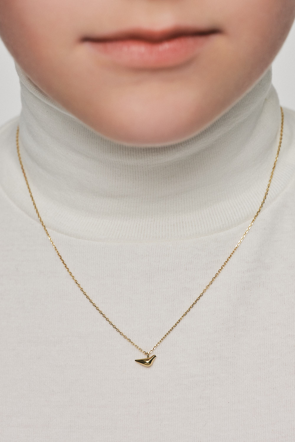 Exclusive Necklaces Mini Bird Girl Pendant, yellow gold from Guzema